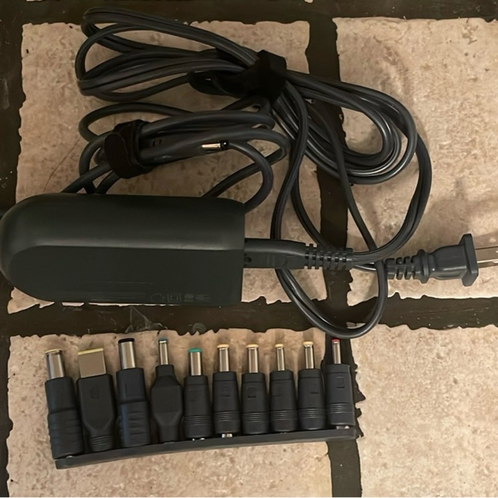 Onn. Laptop charger with 10 interchangeable tips